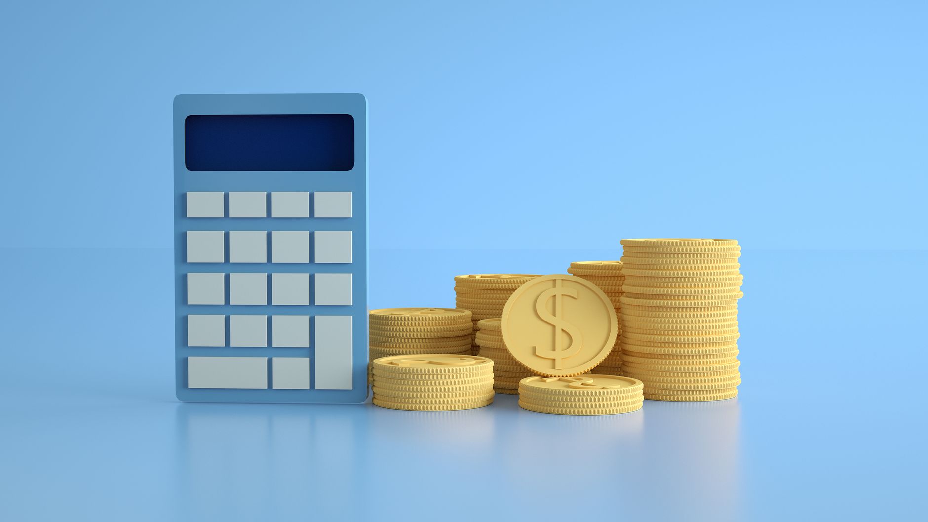 A person using a calculator and notebook to organize assets and liabilities on a wooden desk