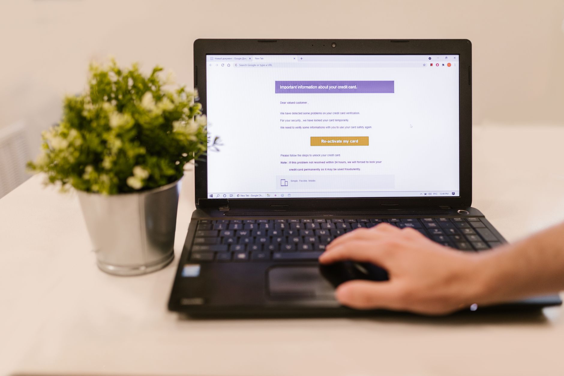 A person checking their credit score on a laptop screen showing an excellent rating