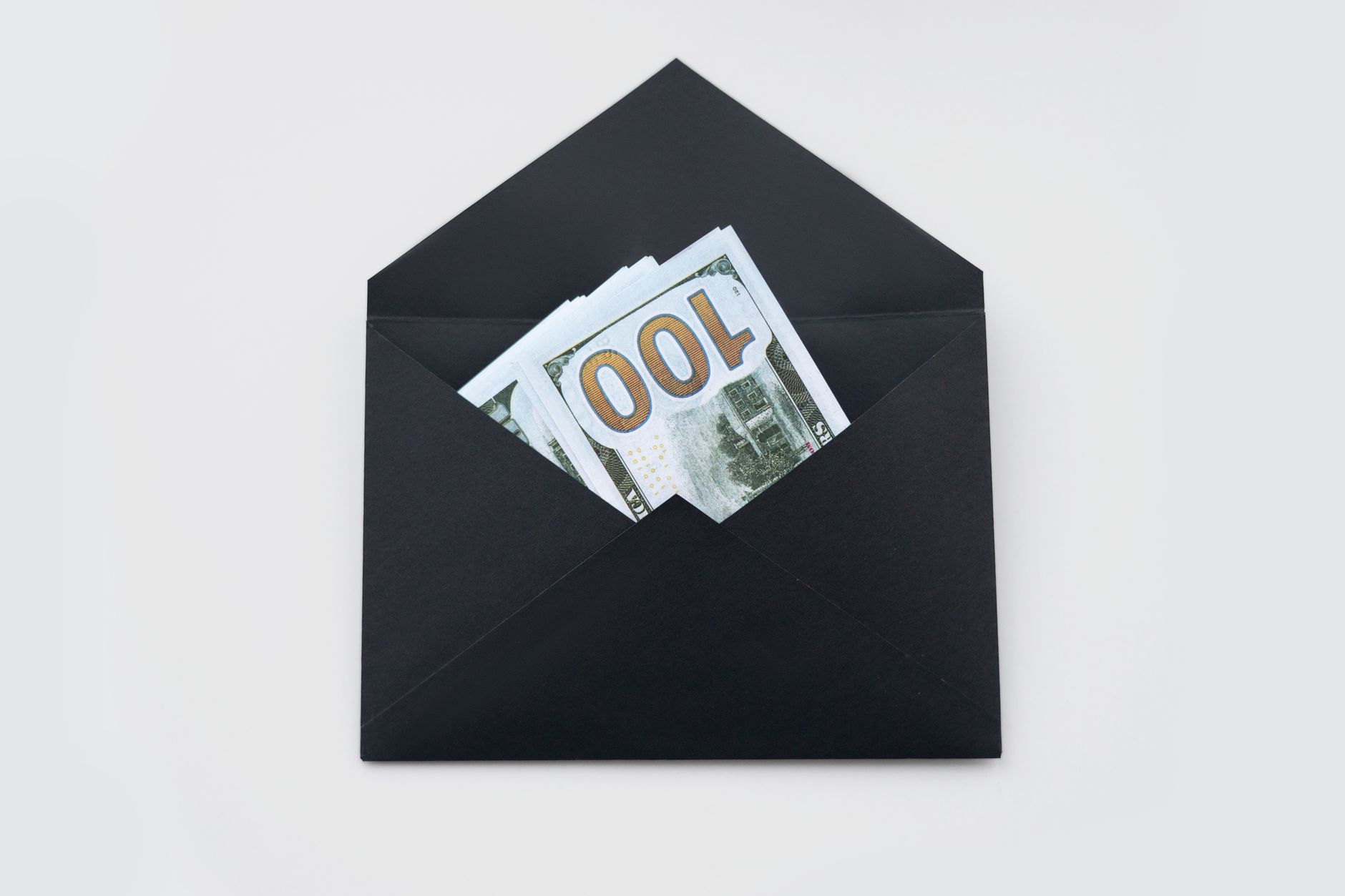 A person weighing whether to withdraw Roth IRA contributions for an emergency expense