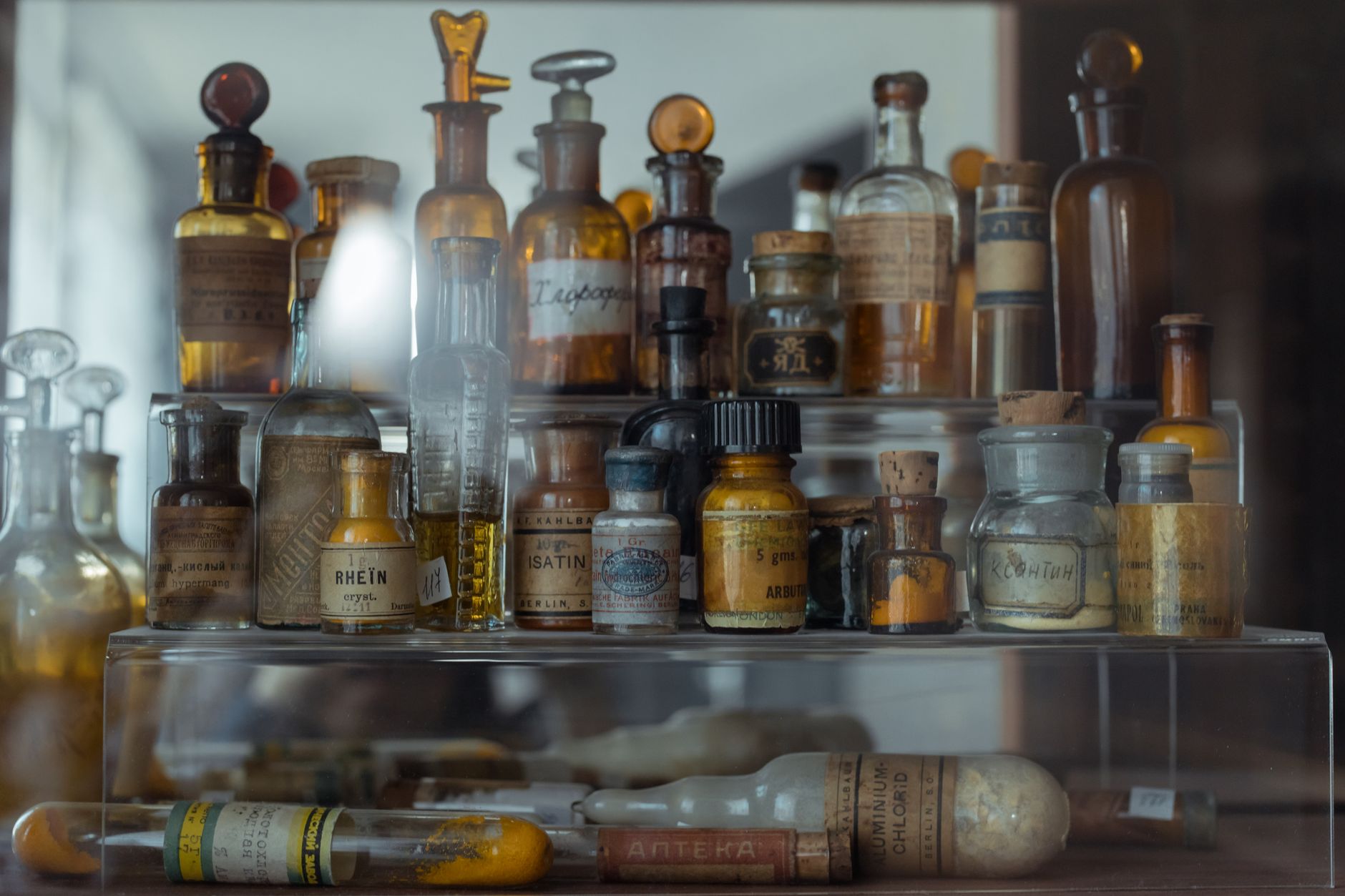 A organized cabinet with contact lens solution, bandages, and sunscreen representing eligible HSA items