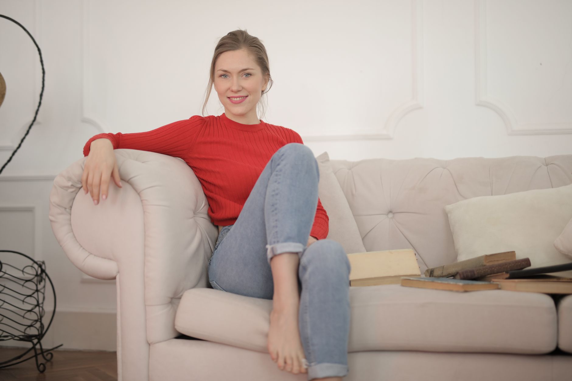 A person enjoying a high-quality home item after achieving financial milestones