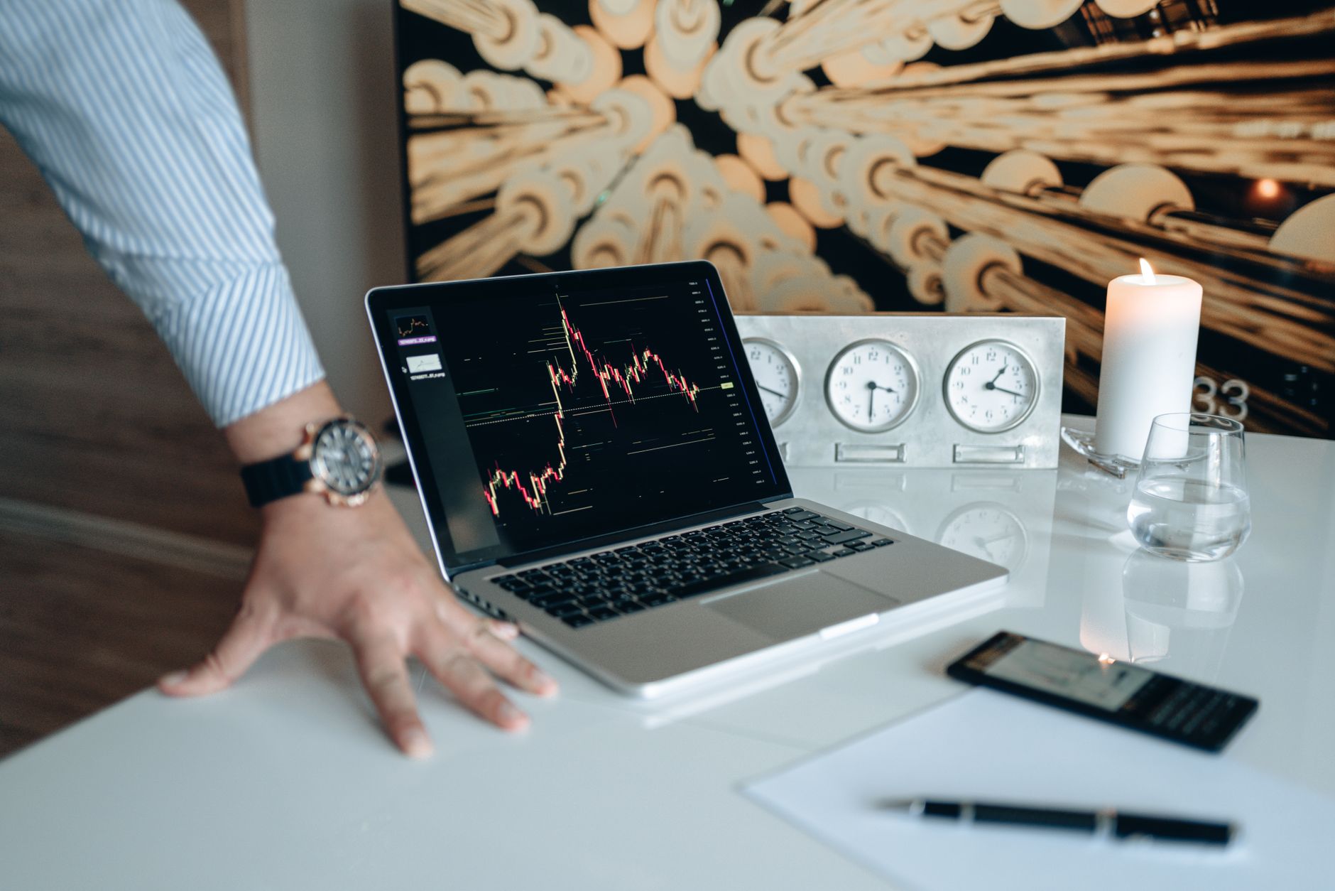 An investor looking worriedly at a laptop screen reviewing financial advisor red flags