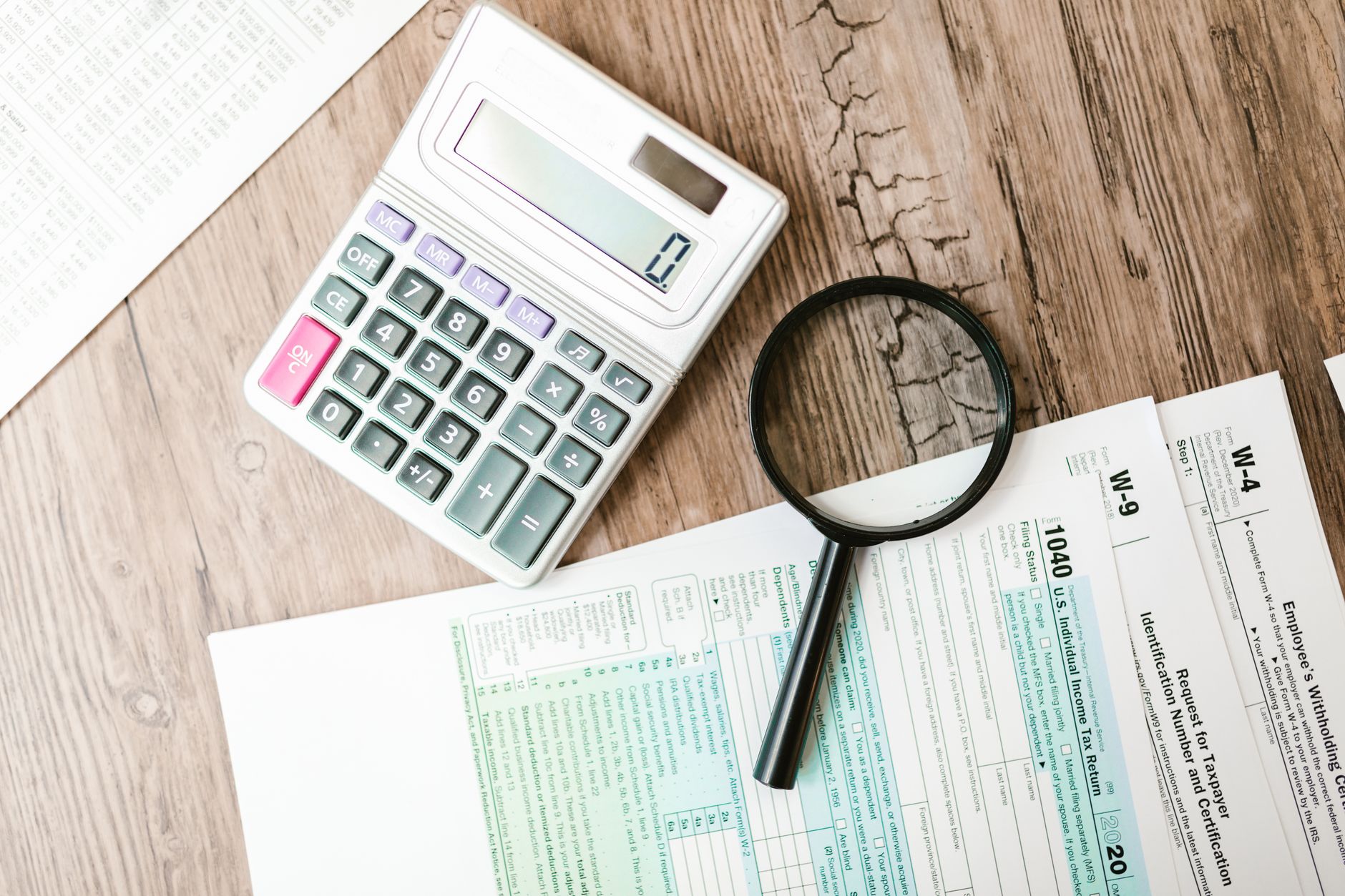 A screenshot of the IRS Tax Withholding Estimator tool on a laptop