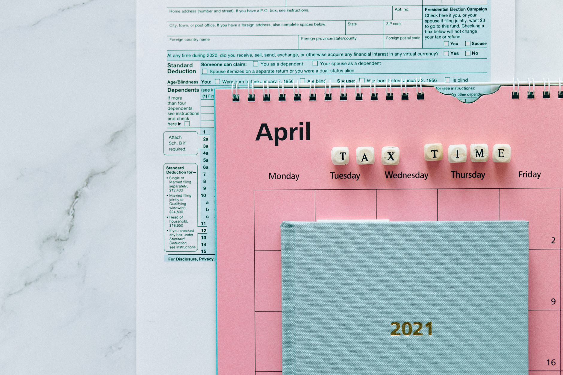 A calendar highlights the annual increases in the standard deduction for single and joint filers